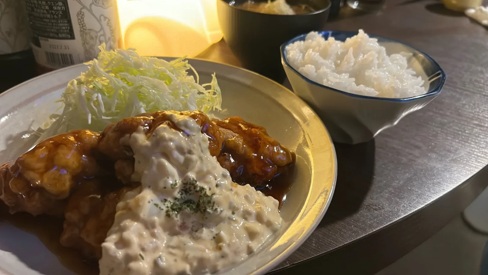 A plated meal with a bowl of rice